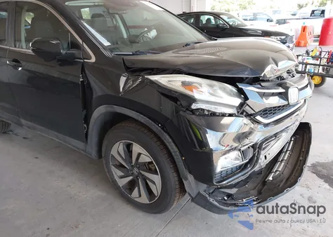 2016 Honda Cr-V Touring z USA, uszkodzony, nr VIN 5J6RM4H96GL107725